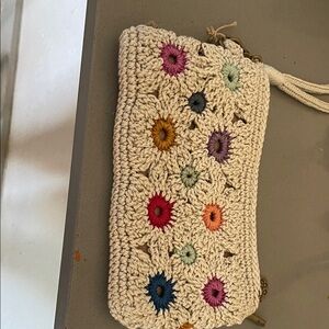 The Sak Cream Crochet Wristlet Clutch with Multicolor Floral Accents